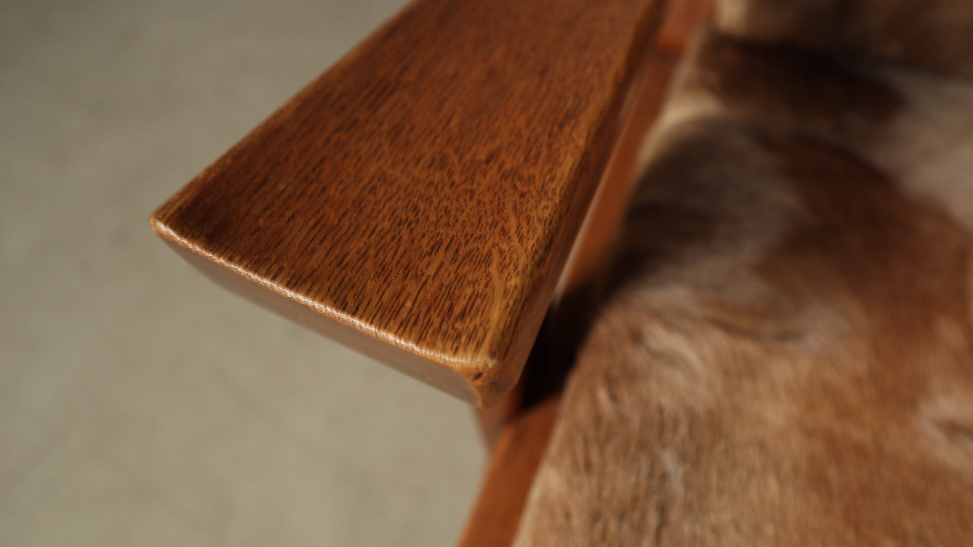 Brutalist oak lounge chair and ottoman in original goat hide, 1960s