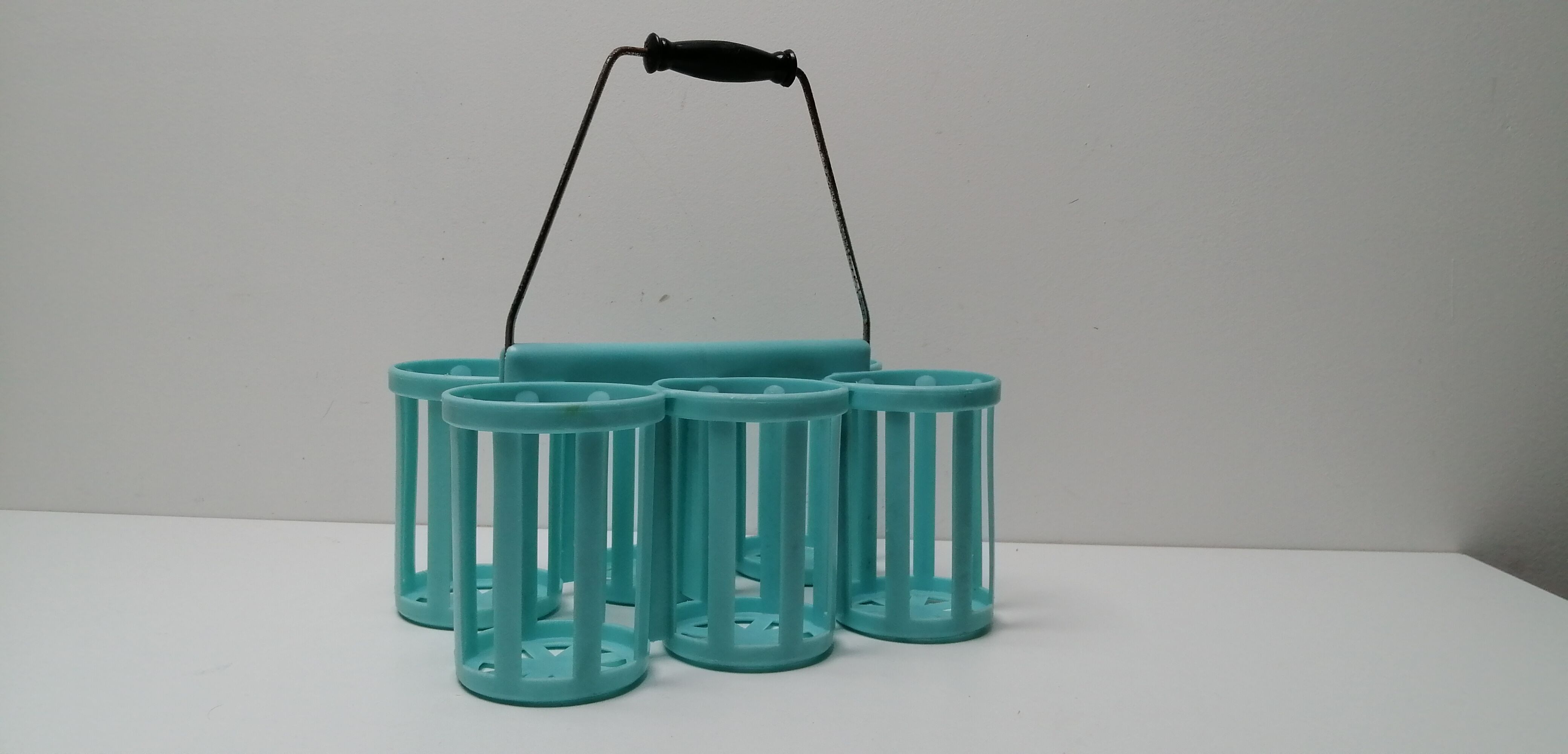 Vintage blue plastic bottle holder