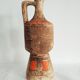 Egyptian pattern ceramic pitcher, red-orange enamels