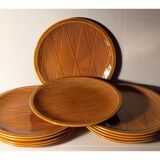 Ten plates in Salins slip with braided patterns 50s