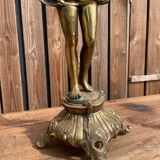 Large bronze candle holder with putti angel