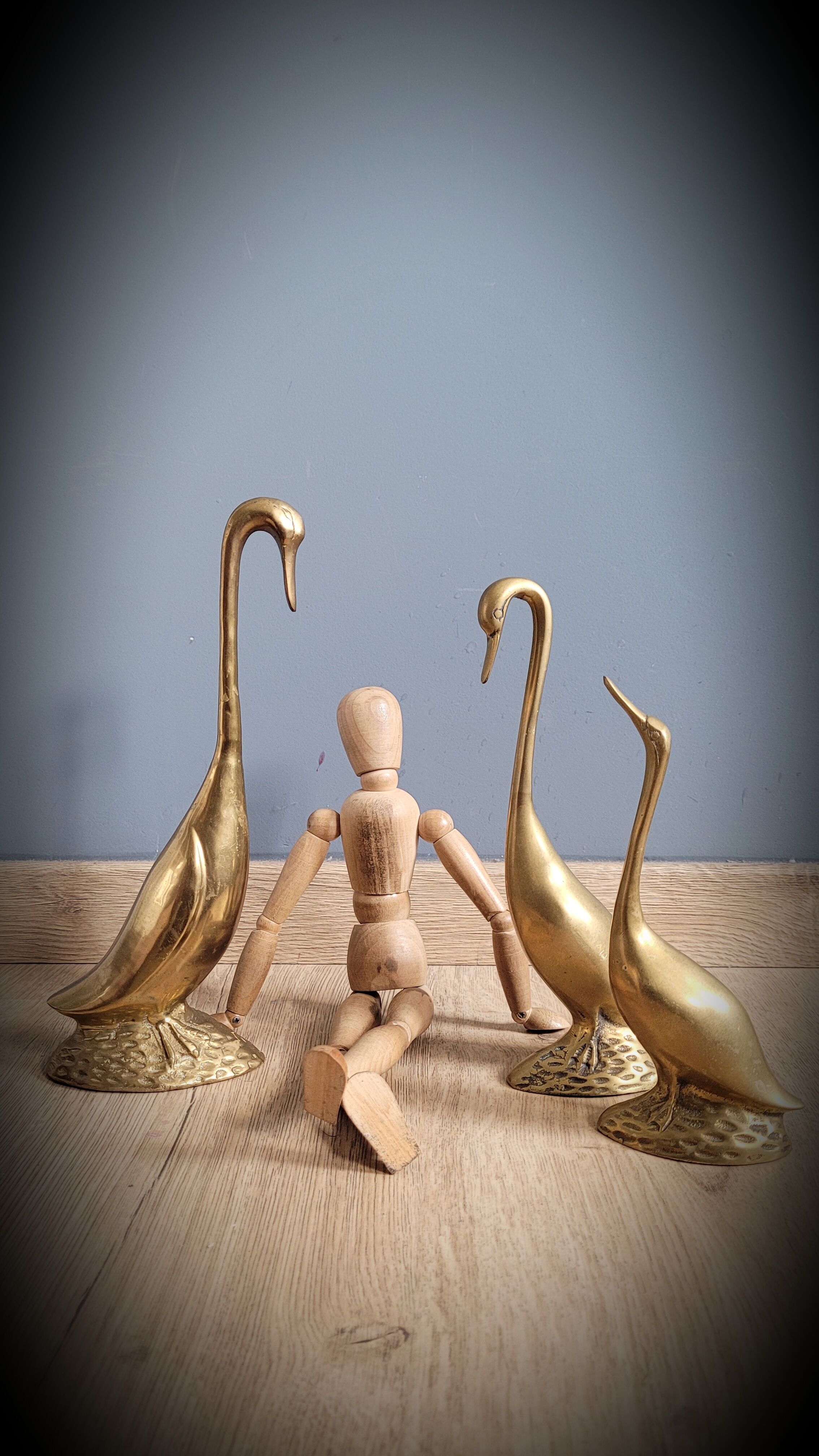 Trio of brass geese