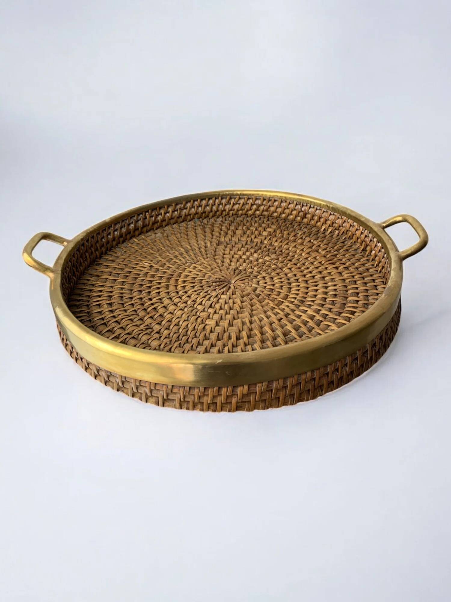 Circular rattan and brass tray, Italy, 1970s, 38 cm diameter