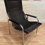 Black leather reclining lounge chair, "Hans Eichenberger" design, 1960.