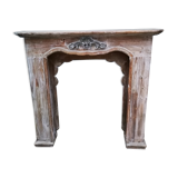 Patinated wooden fireplace