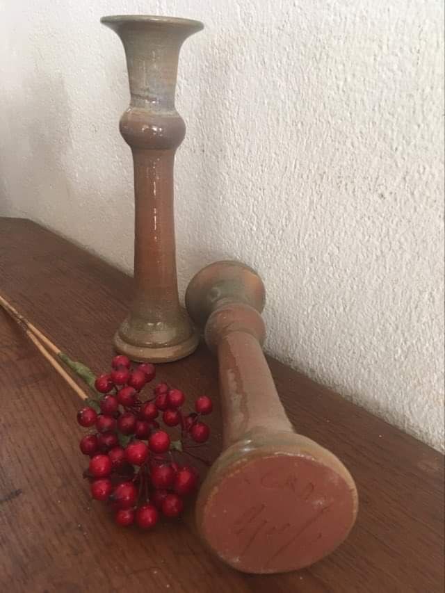 Terracotta candlesticks signed