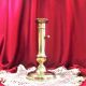 Gilded copper push candle holder