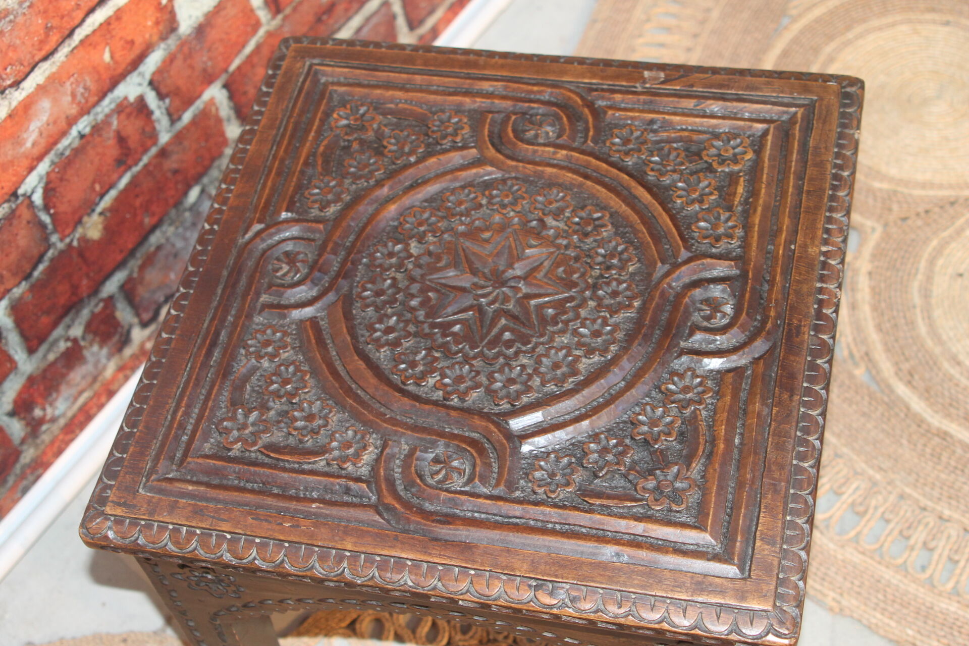 Side table carved top