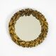 Beautiful small French mid-century wall mirror with an ornate brass frame