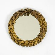 Beautiful small French mid-century wall mirror with an ornate brass frame