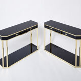 Pair of black lacquered consoles and brass 1970