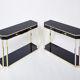 Pair of black lacquered consoles and brass 1970