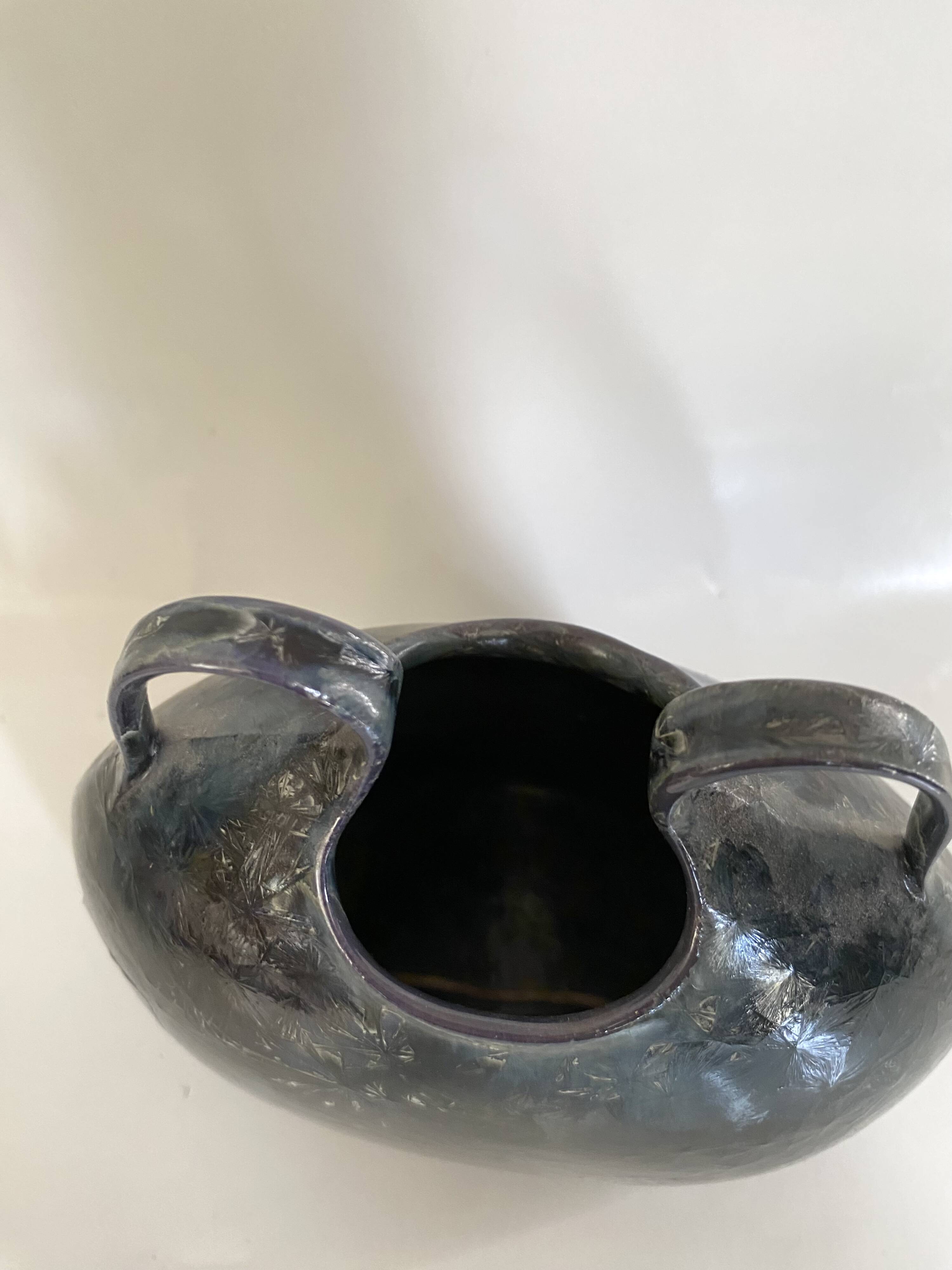 Iridescent ceramic vase with handles