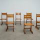 Set of six sculptural oak dining chairs