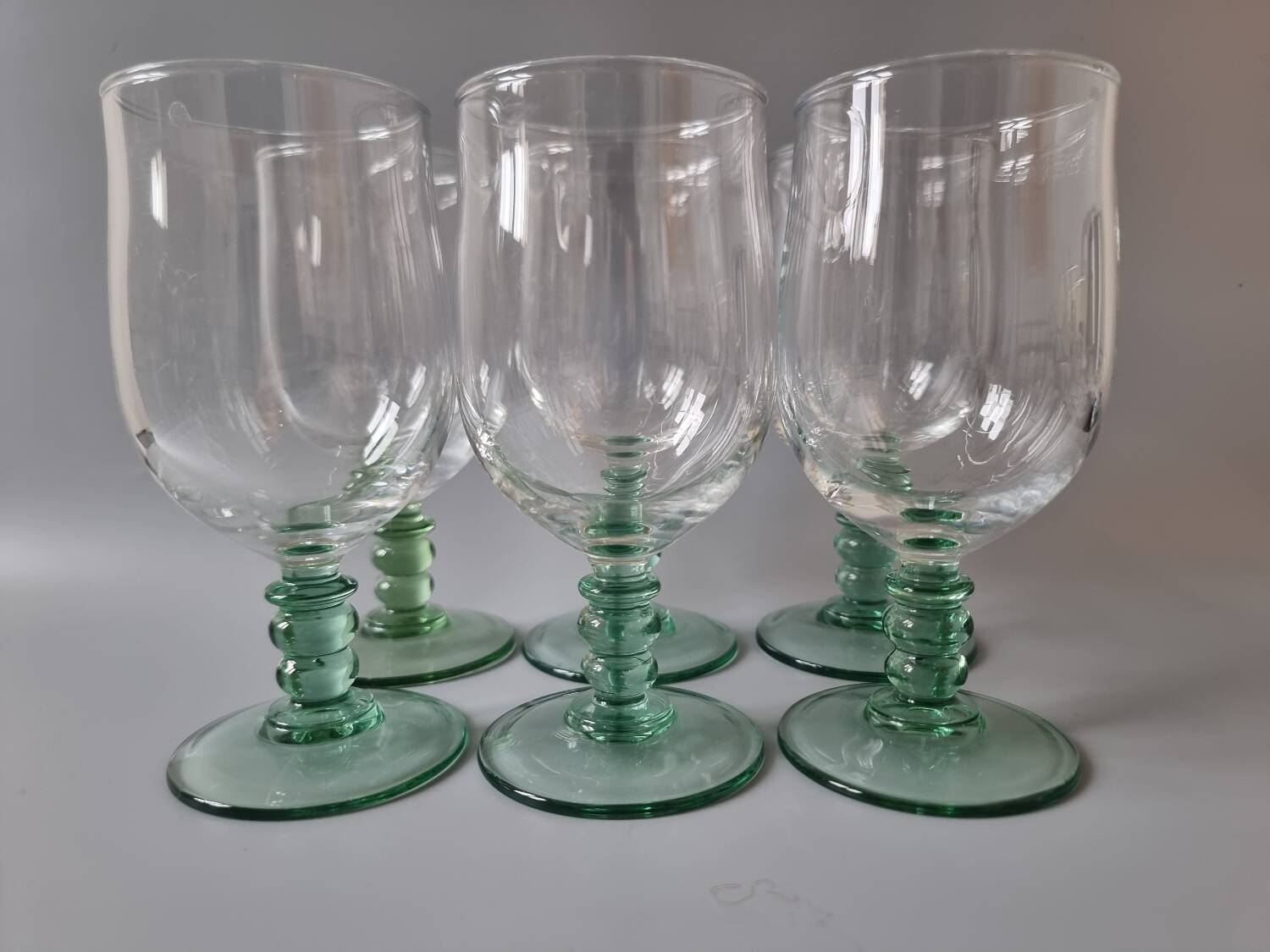 Green stemmed glasses