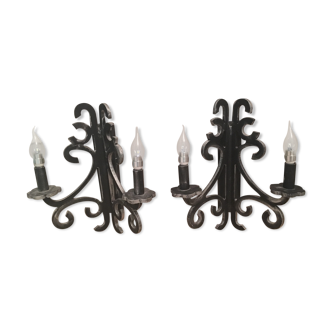 Two black and silver wood wall sconces