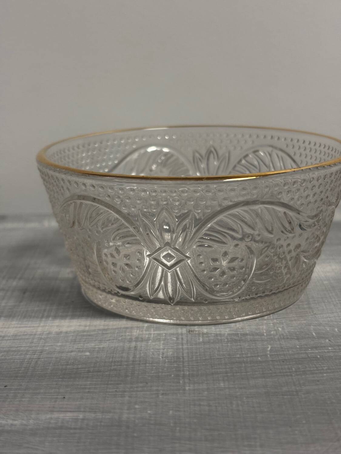 Set of 3 glass bowls with gold embellishments.