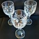 Set of three cut Bohemian Crystal Stemmed Glasses.