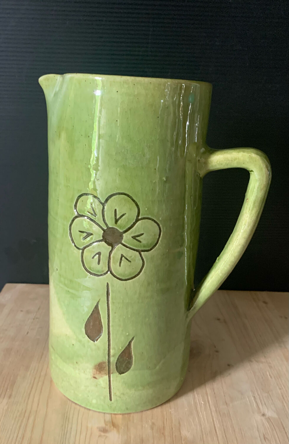 Green ceramic pitcher