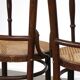 4 antique wooden and cane bistro chairs
