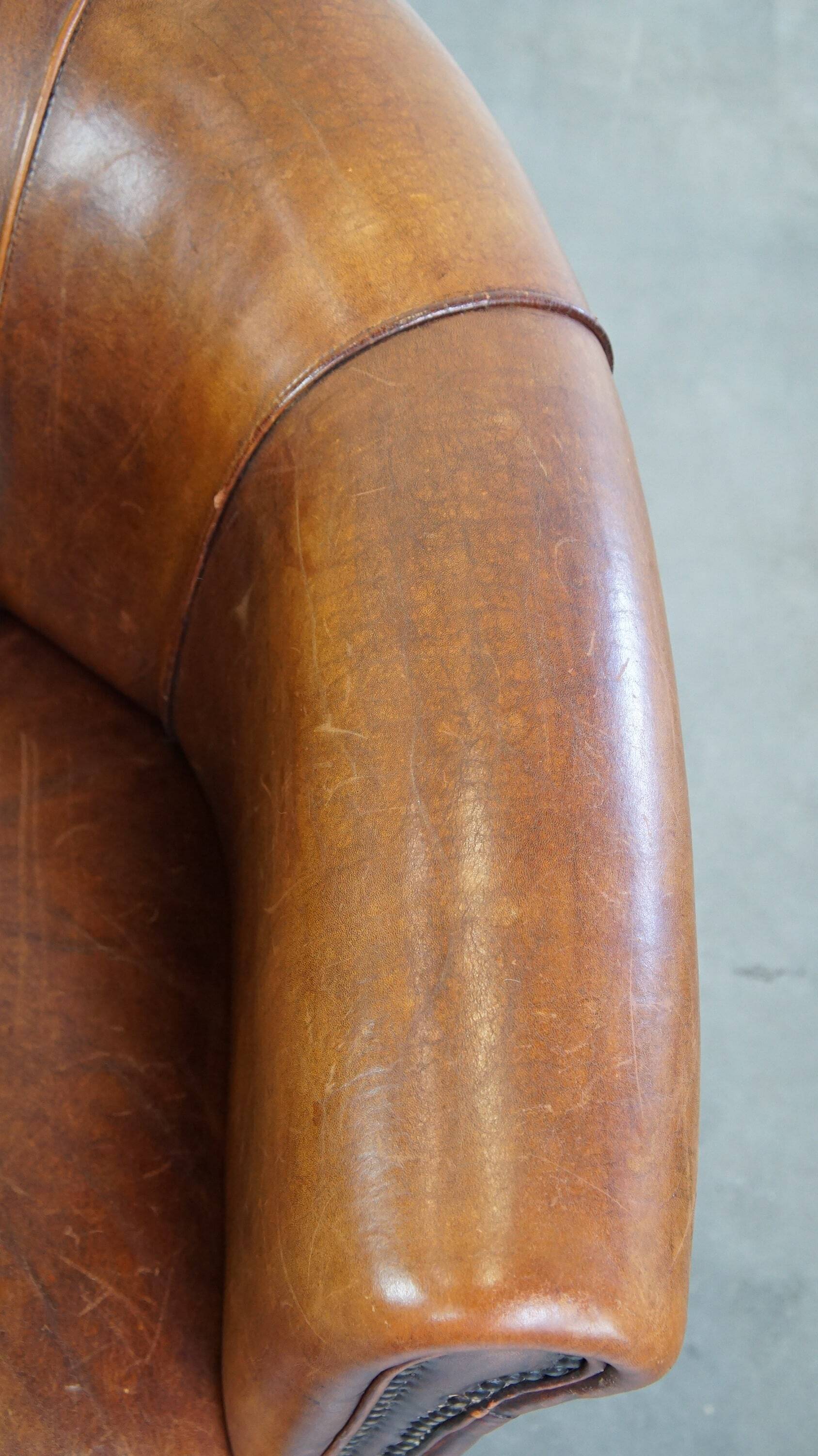 Brown leather club chair