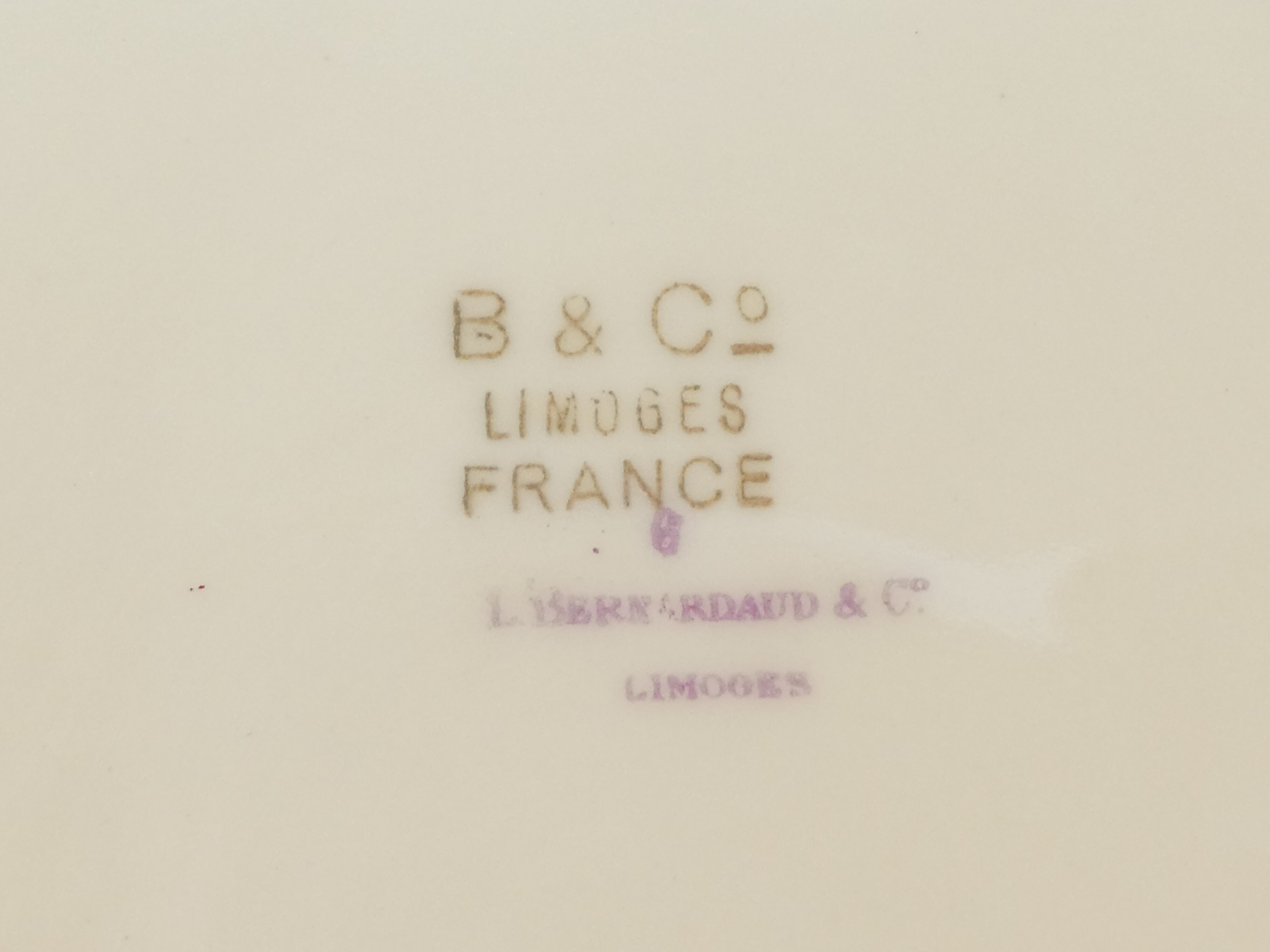 Compotier en porcelaine bernardaud limoges décor fleur rose / pourpre