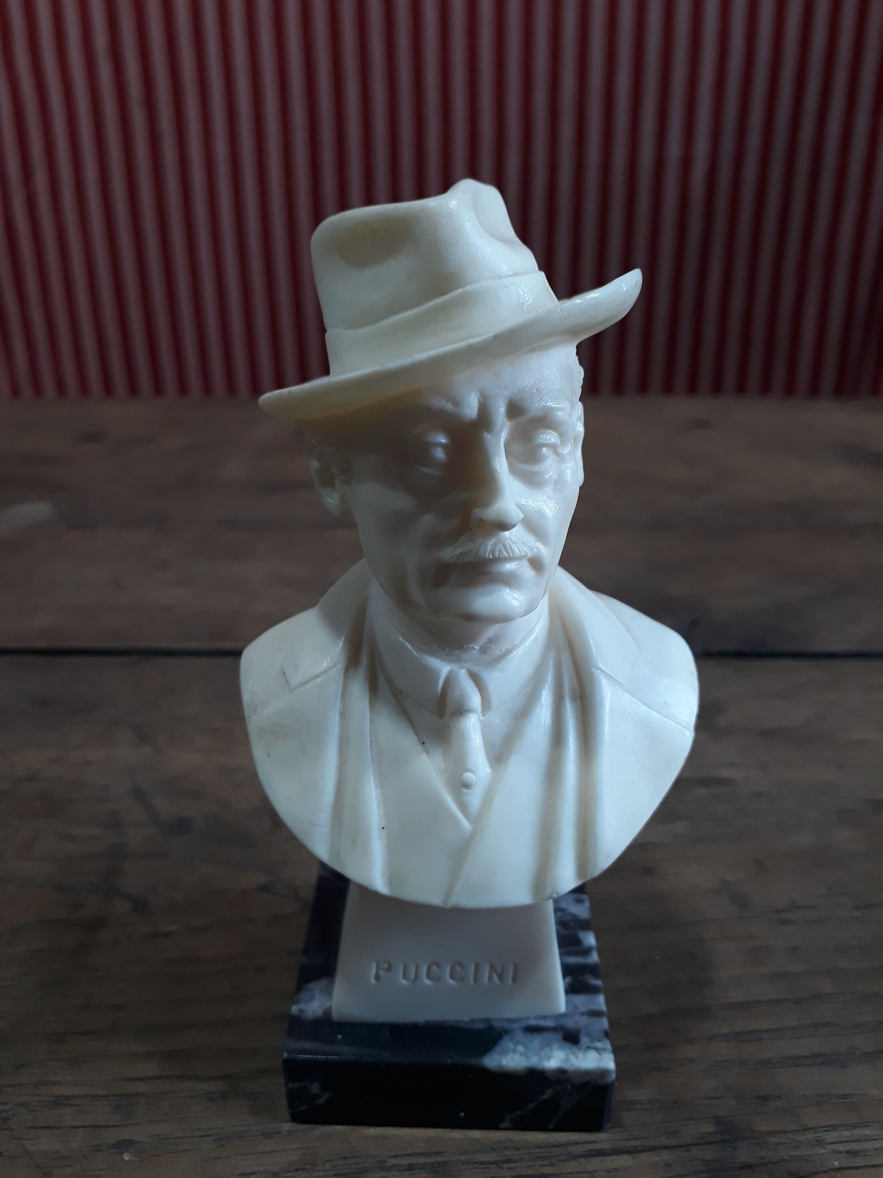Resin bust by Puccini, marble base