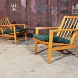 Paire de fauteuils ton vert foncé