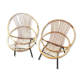 2 fauteuils coquilles en rotin , pieds métal année 50