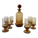 Art Deco liqueur set in amber glass