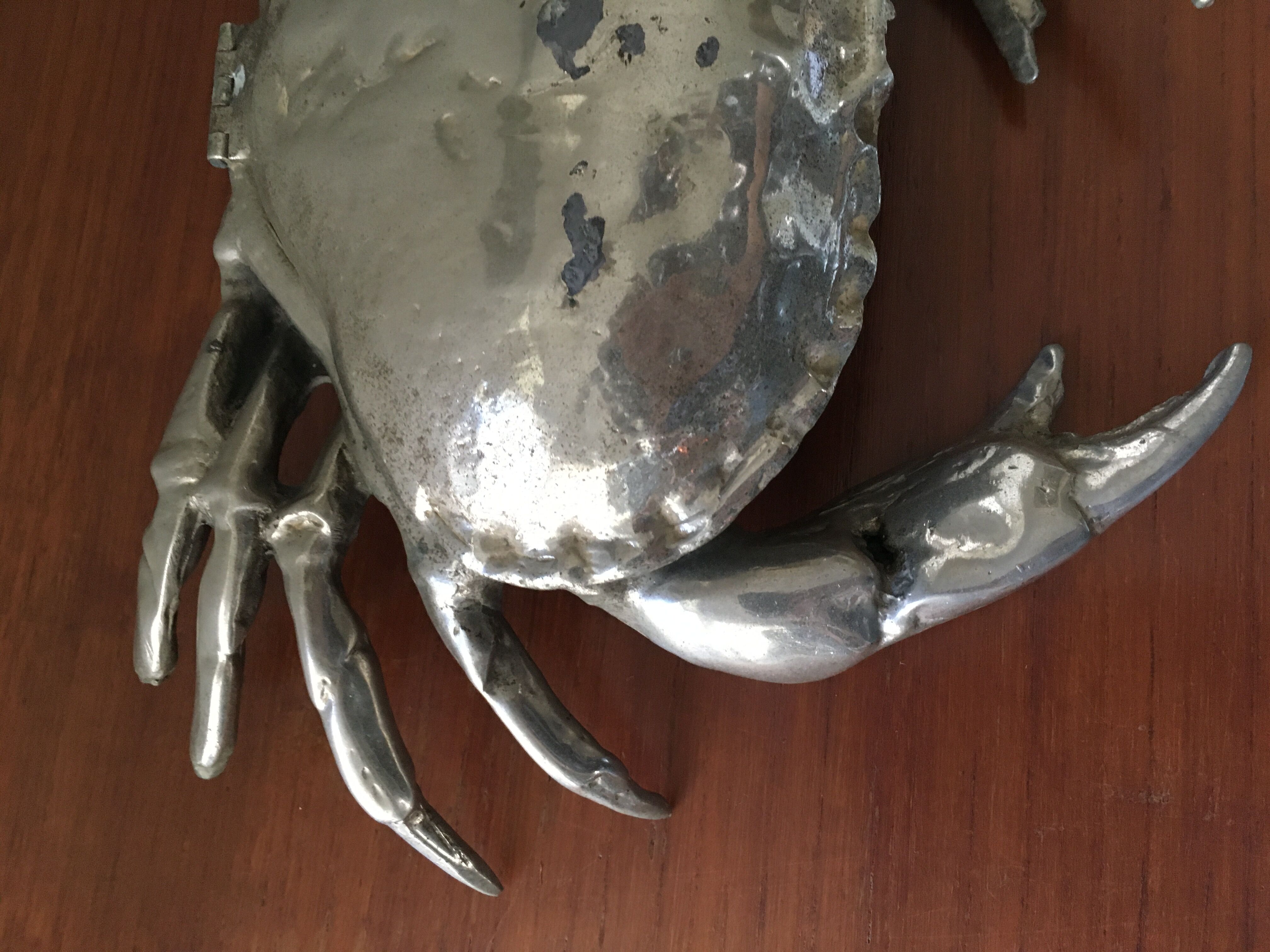 Silver metal box in crab shape