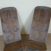 Central Africa circa 1950: pair of exotic wood chairs decorated with crocodile sculptures