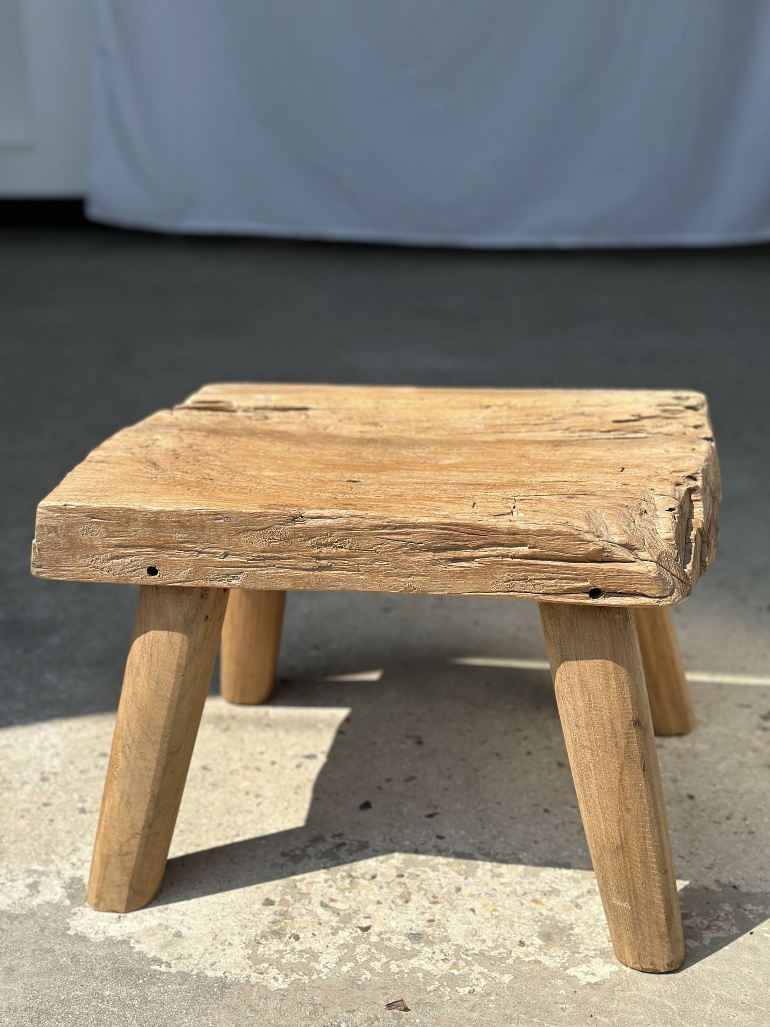 Small side table or stool in four-legged blond teak H:30 L43 l30