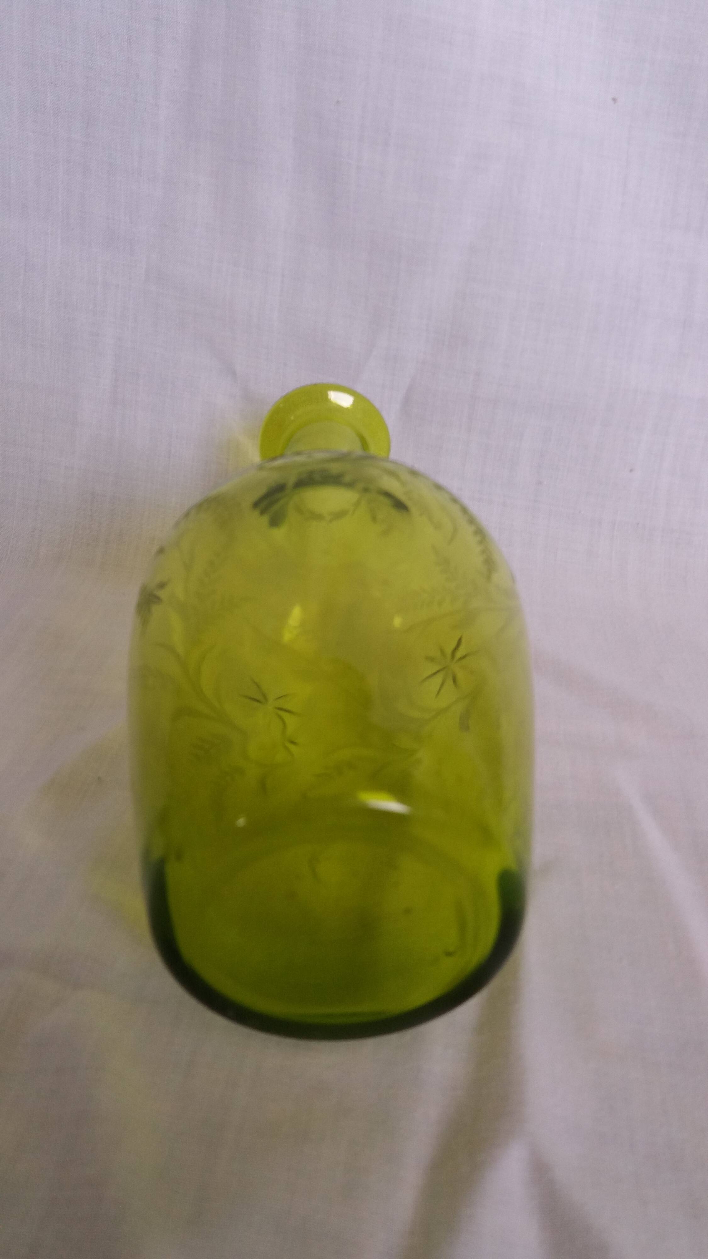 Cut and engraved green blown glass carafe vase