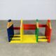 Modular wall-mounted pencil shelf in Pierre Sala style, for children.