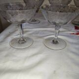 Beautiful set of seven crystal champagne glasses engraved with vine branches