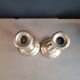 Pair of antique silver-plated brass candlesticks