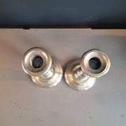 Pair of antique silver-plated brass candlesticks
