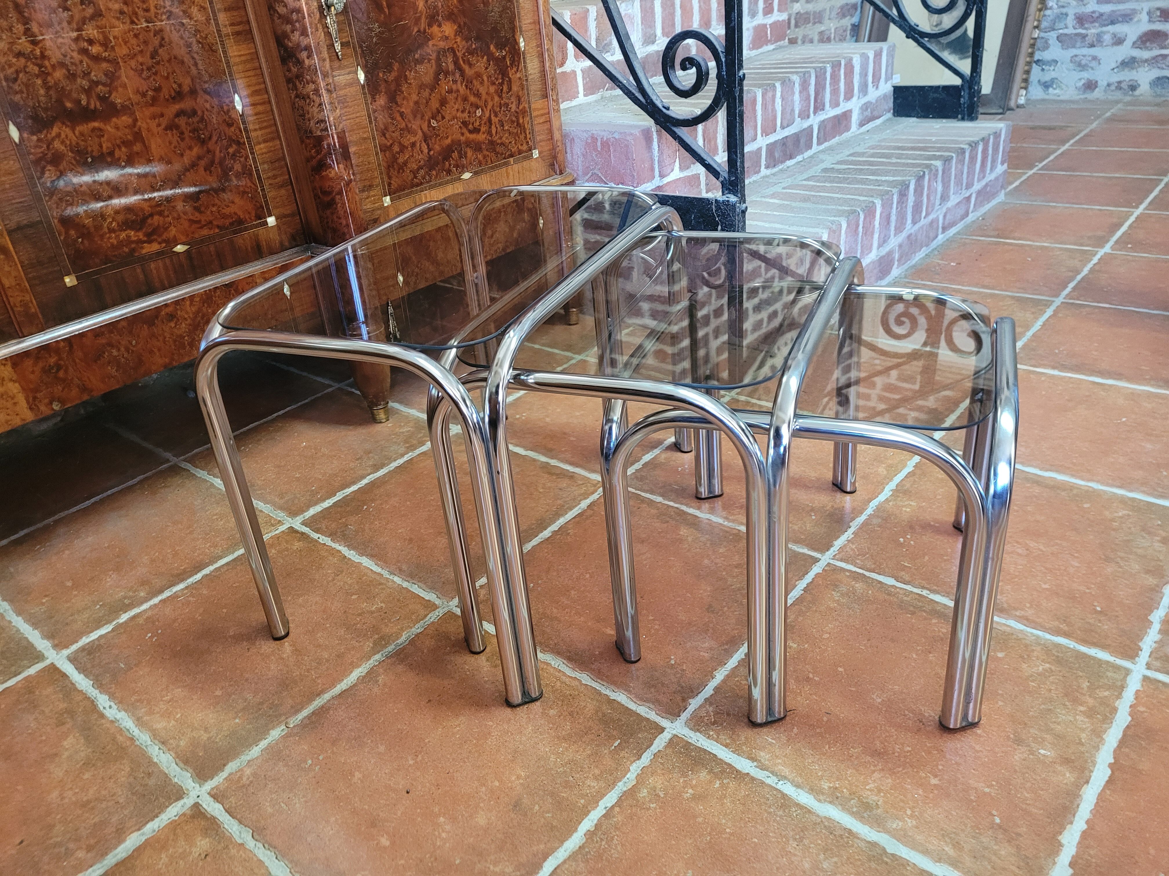 Chrome nesting table with smoked glass top from the 70s