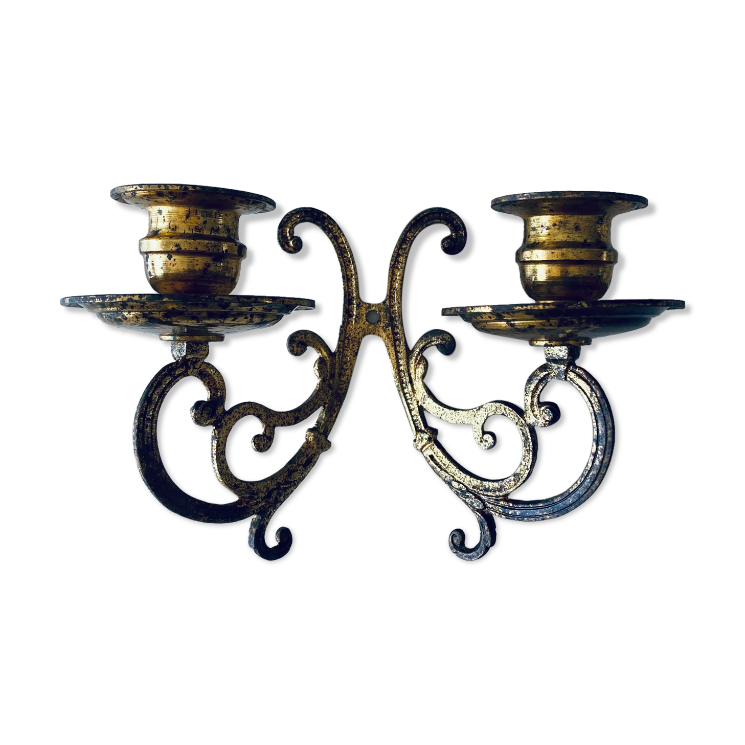 Old wall candle holder in golden brass
