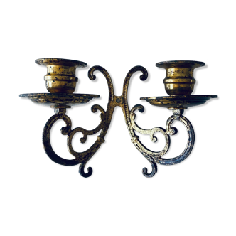 Old wall candle holder in golden brass