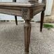 Wooden armchair with caning in Louis XVI style