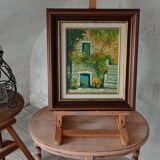 Framed oil painting on panel