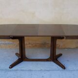 Oval dining table extendable by Baumann