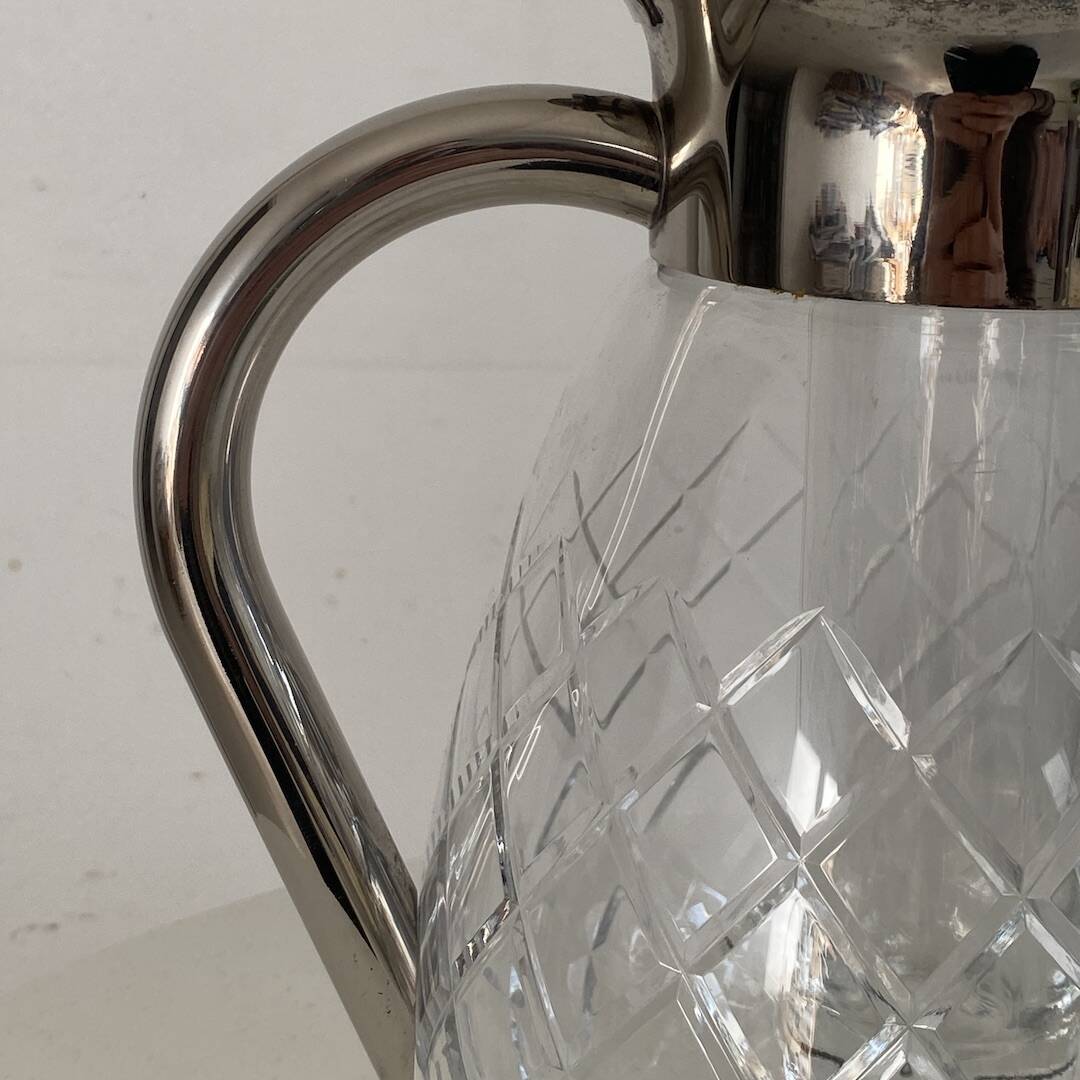 Cut glass and silver-plated metal ice carafe