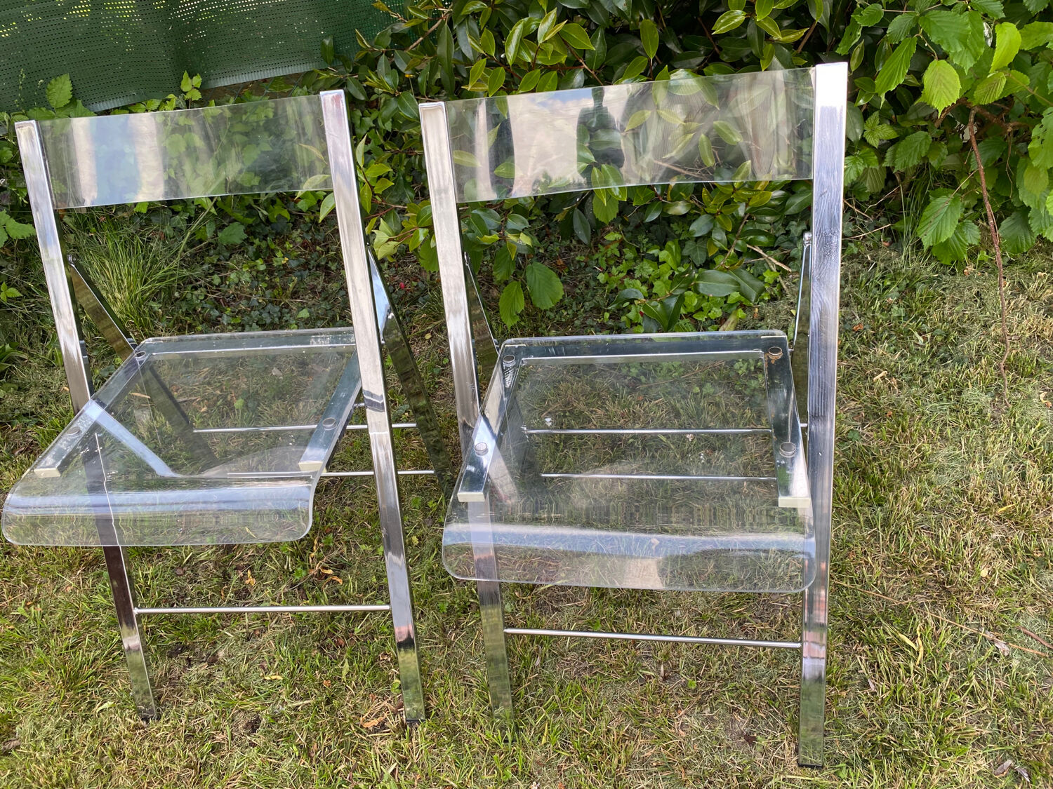 Folding plexiglass chairs