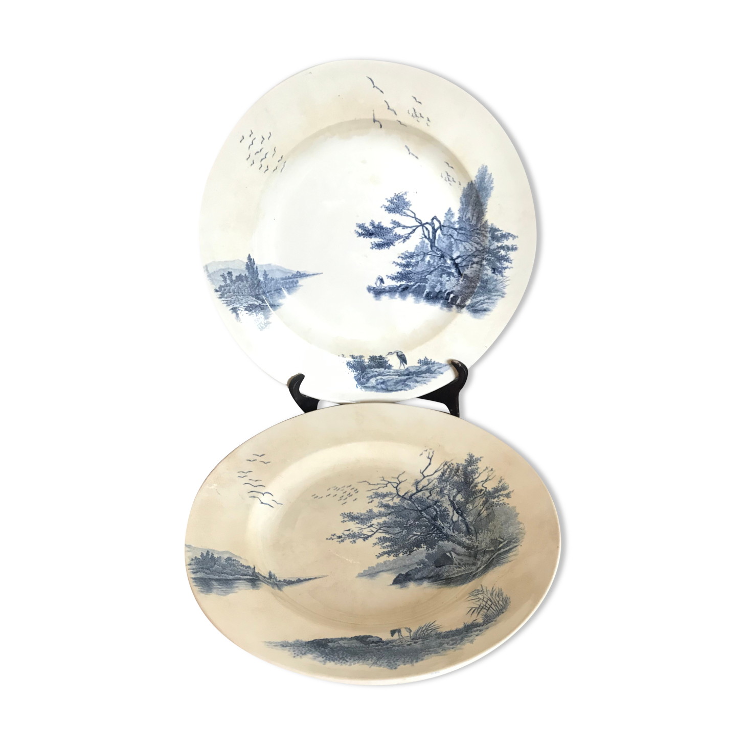 Two iron earth dishes