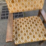 2 Henri II armchairs in solid wood and yellow-beige velvet.