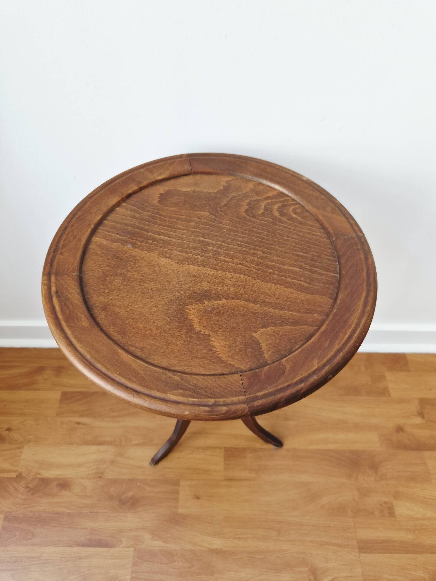 Small tripod wooden table with a vintage round top -