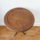 Small tripod wooden table with a vintage round top -